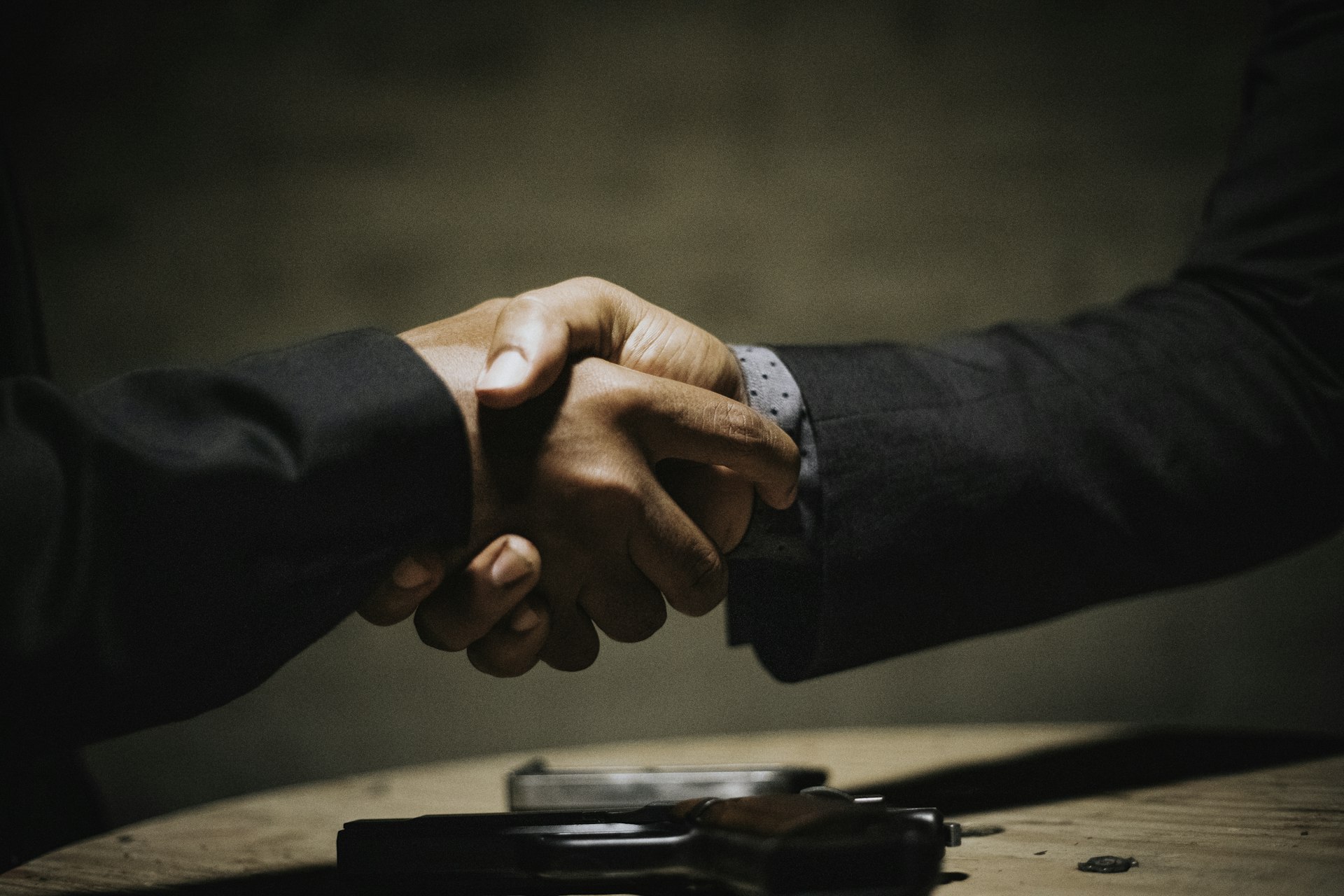 Business professionals shaking hands